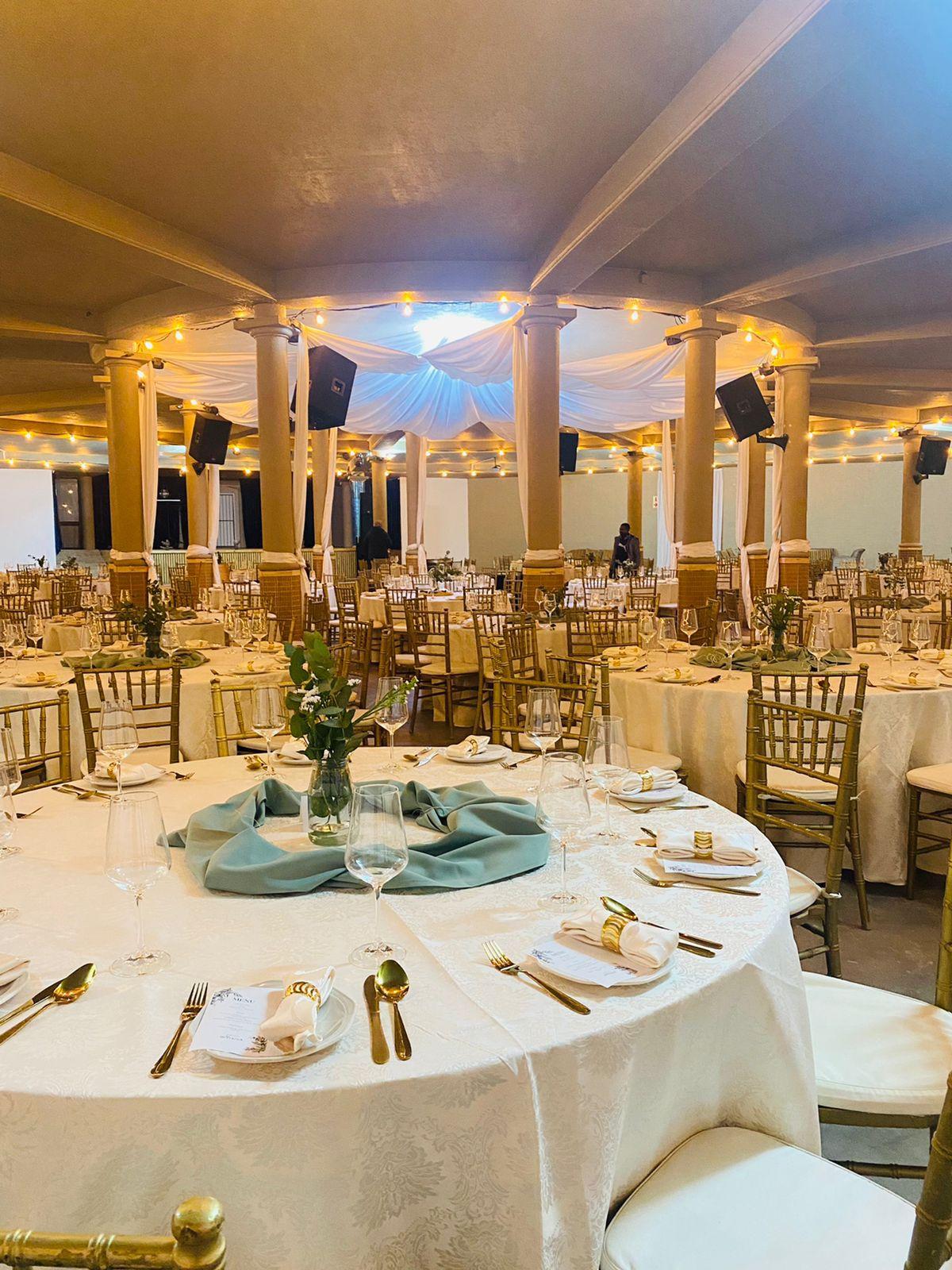 Wedding reception venue set with round tables at Morgenhof Estate